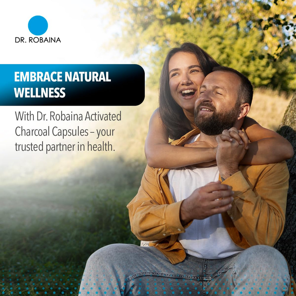 Dr. Robaina cápsulas carbón activado 1200 mg con agua para ingestión fácil.