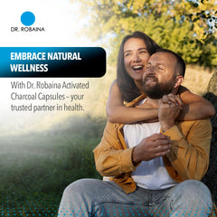 Dr. Robaina cápsulas carbón activado 1200 mg con agua para ingestión fácil.