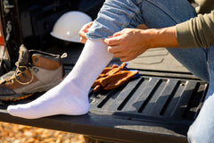 Dr. Scholl's socks in white top view show non-binding cuff for relaxed wear.