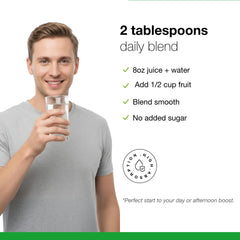 Pouring Dr. Schulze's SuperFood Plus powder into a glass for a quick drink.