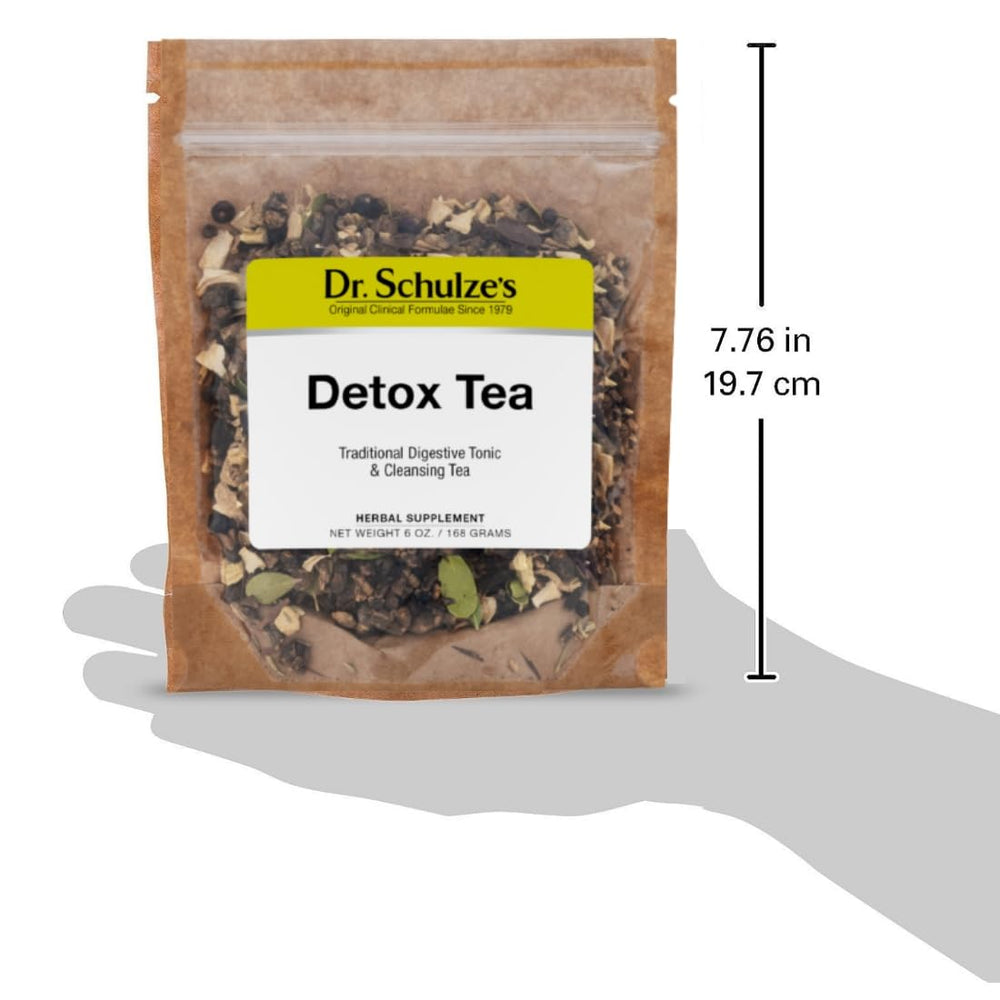 Dr. Schulze's Detox Tea glass cup capturing a calming daily energy ritual