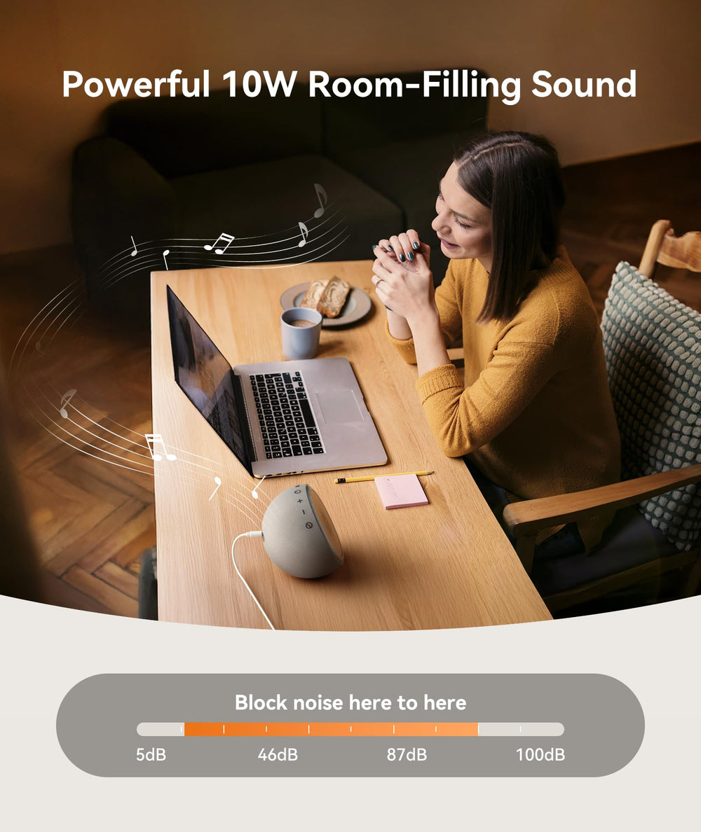 Dreamegg white noise machine paired with a smartphone for streaming audio.
