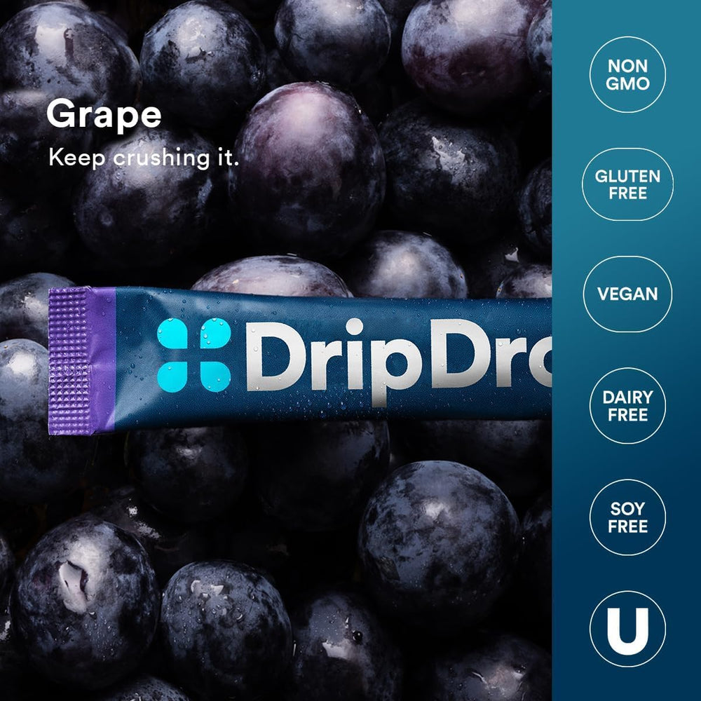 A glass of DripDrop grape hydration showing a flavorful electrolyte drink.