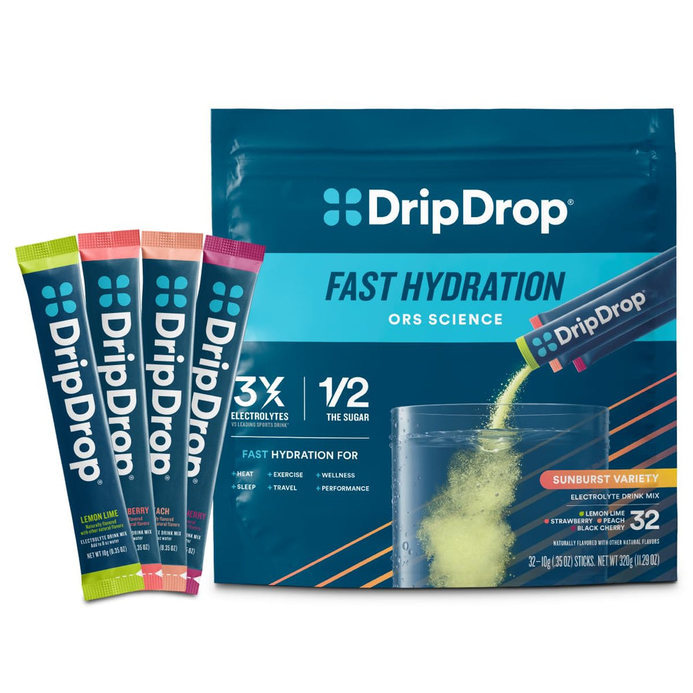 DripDrop Sunburst Lemon Lime packet dissolving in water for fast hydration.