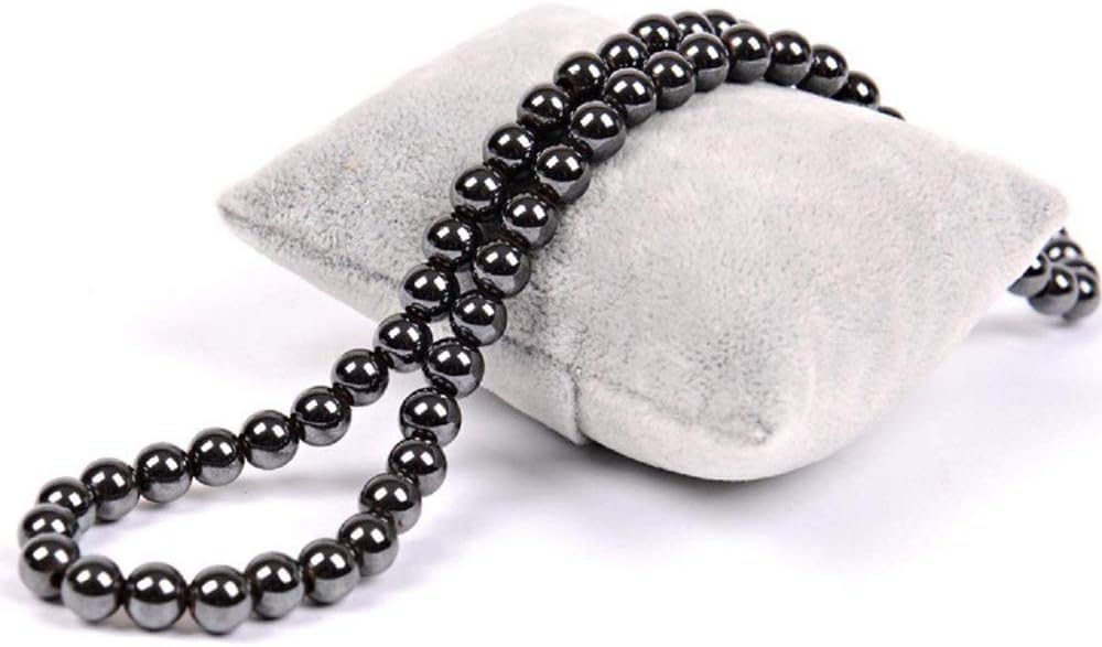 Drkao hematite necklace glossy black finish reflects light with a refined look.