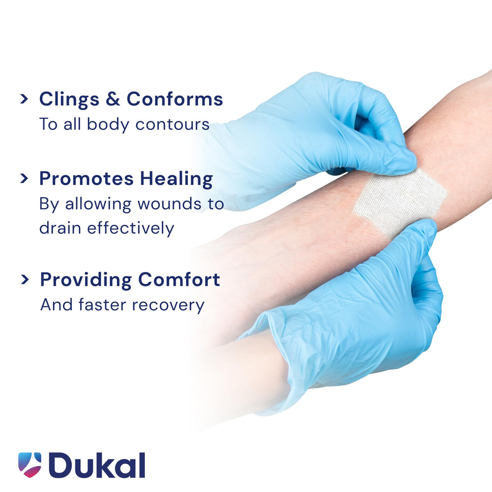 Dukal petrolatum-coated non-adherent surface reduces sticking to wound bed.