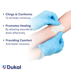 Dukal petrolatum-coated non-adherent surface reduces sticking to wound bed.