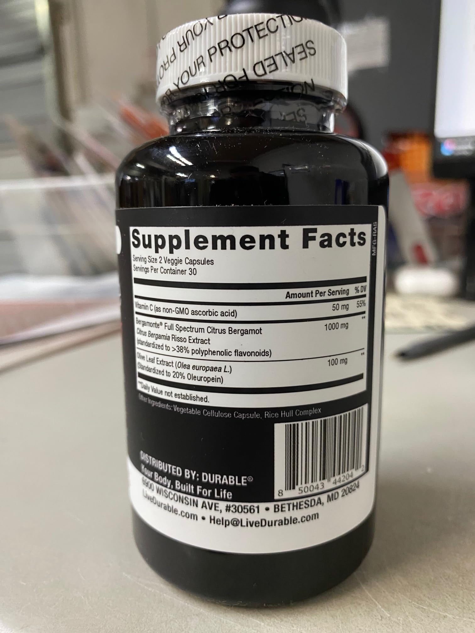 Durable Heart 60 capsules container on countertop