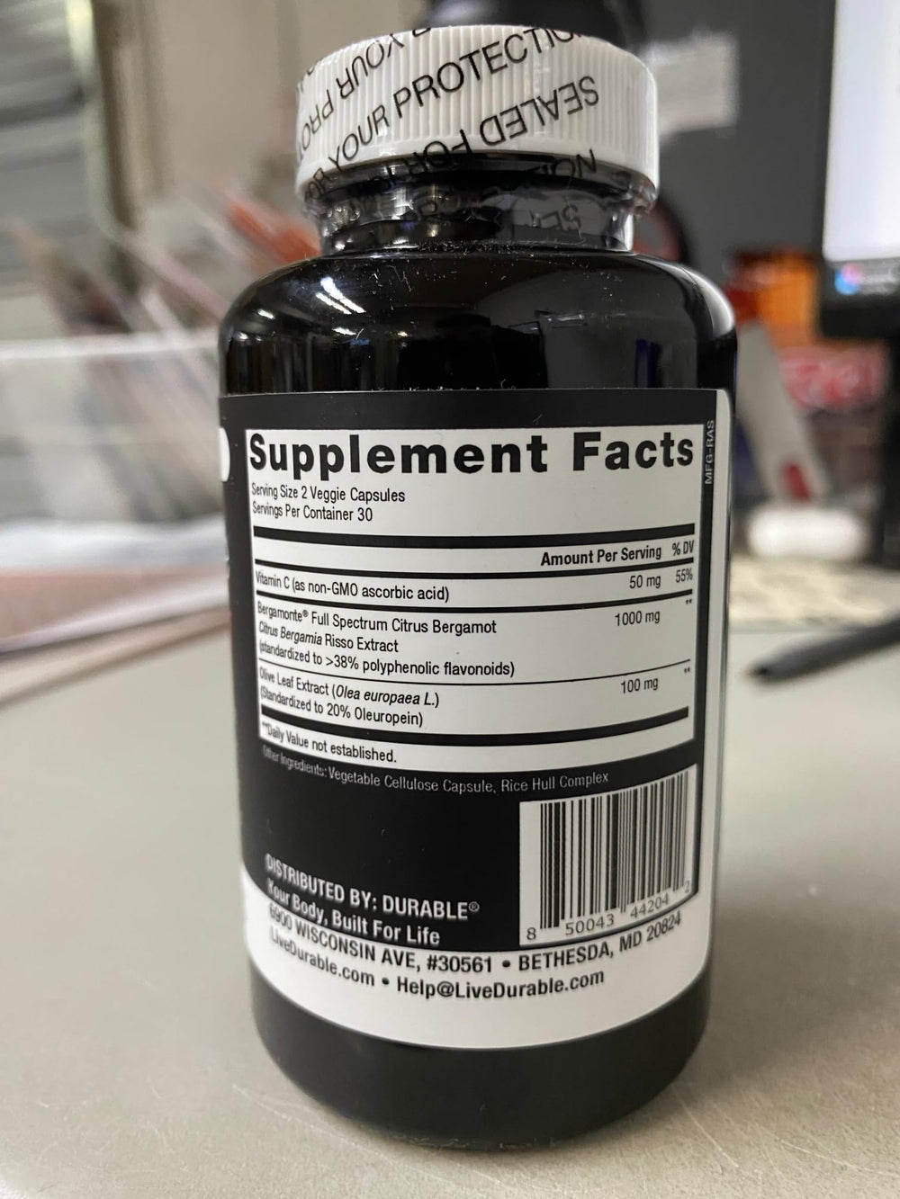 Durable Heart 60 capsules container on countertop