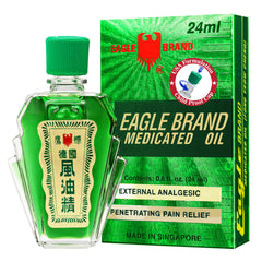 Eagle Brand Natural Medicated Oil green bottle showing herbal blend and refreshing scent.