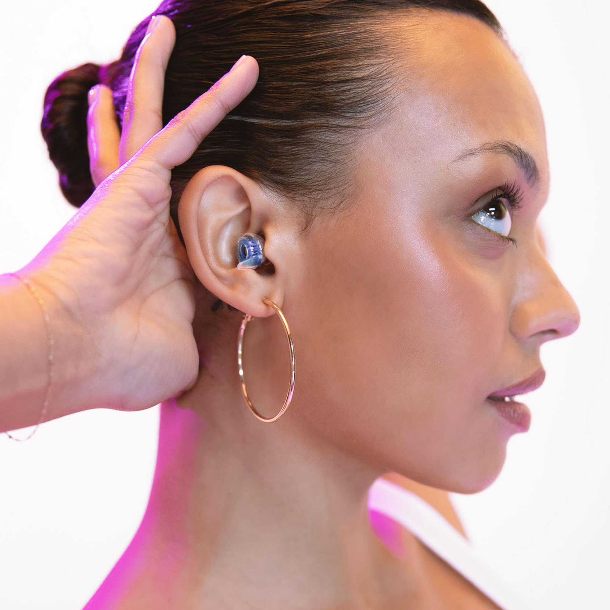 Close-up of blue filters on Eargasm earplugs for balanced attenuation