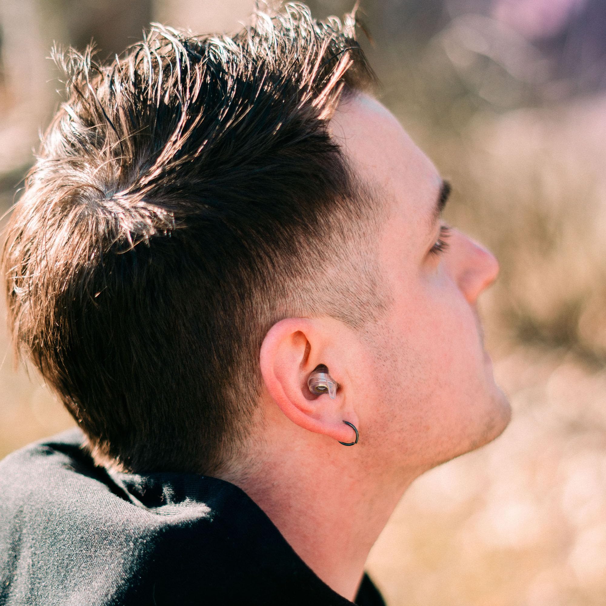 Eargasm earplugs during motorcycle rides provide noise reduction and comfort.