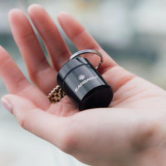 Eargasm keychain earplug case with waterproof seal shields contents from moisture.