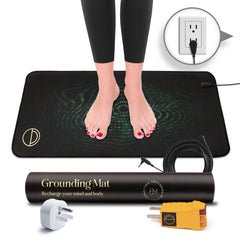 Earth and Moon grounding mat in use with feet on the pad for daily relaxation.