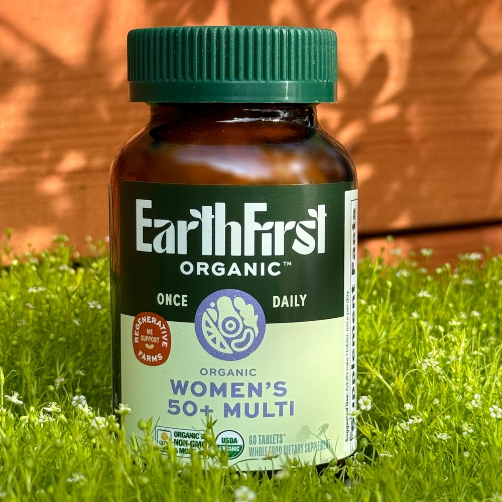 EarthFirst Organic bottle on a bright counter, illustrating a simple daily wellness routine.