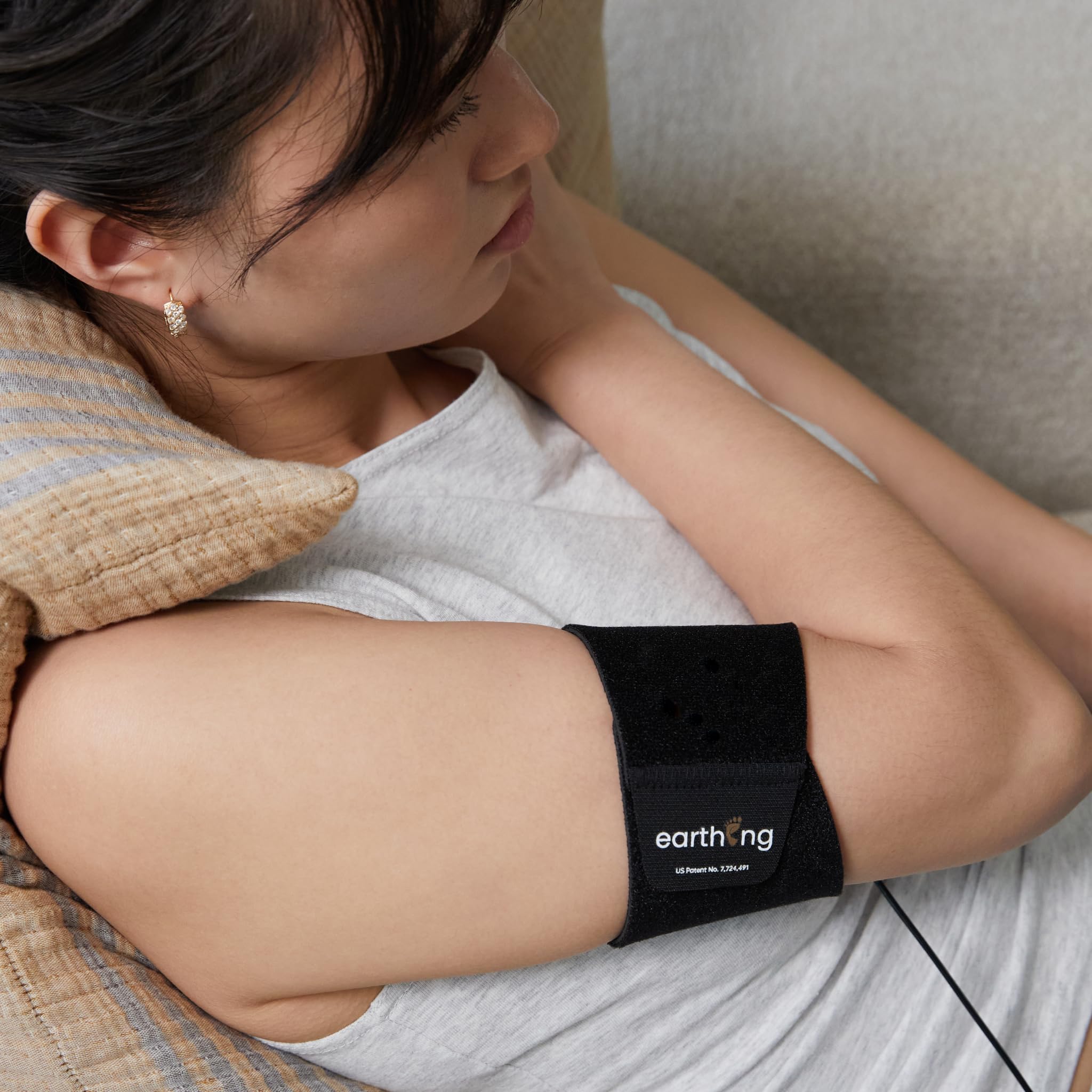 Earthing Universal Band around ankle for easy grounding during daily activities