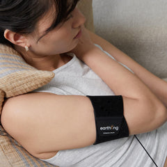 Earthing Universal Band around ankle for easy grounding during daily activities