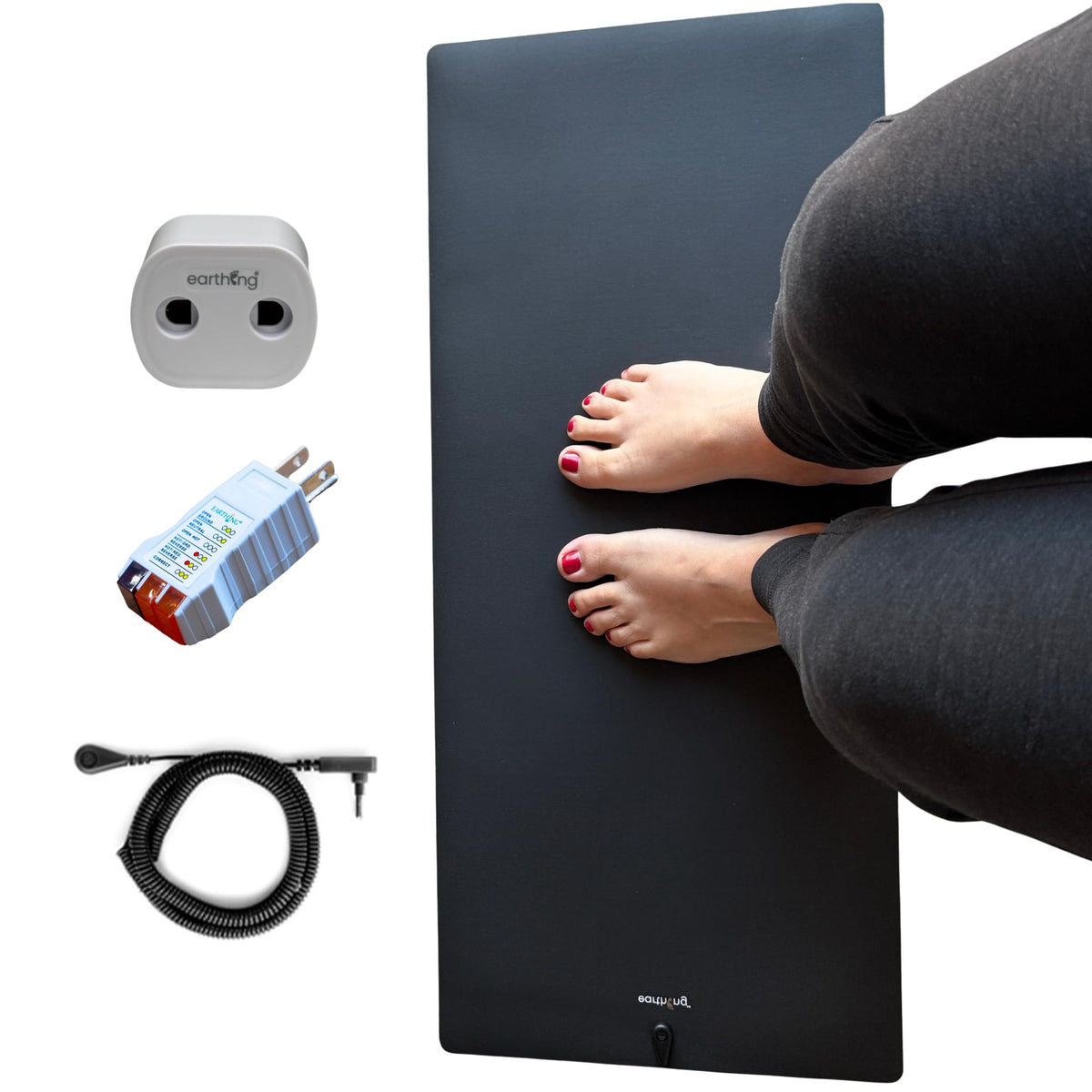 Earthing Universal Mat Kit grounding mat in use at a desk for focused grounding.