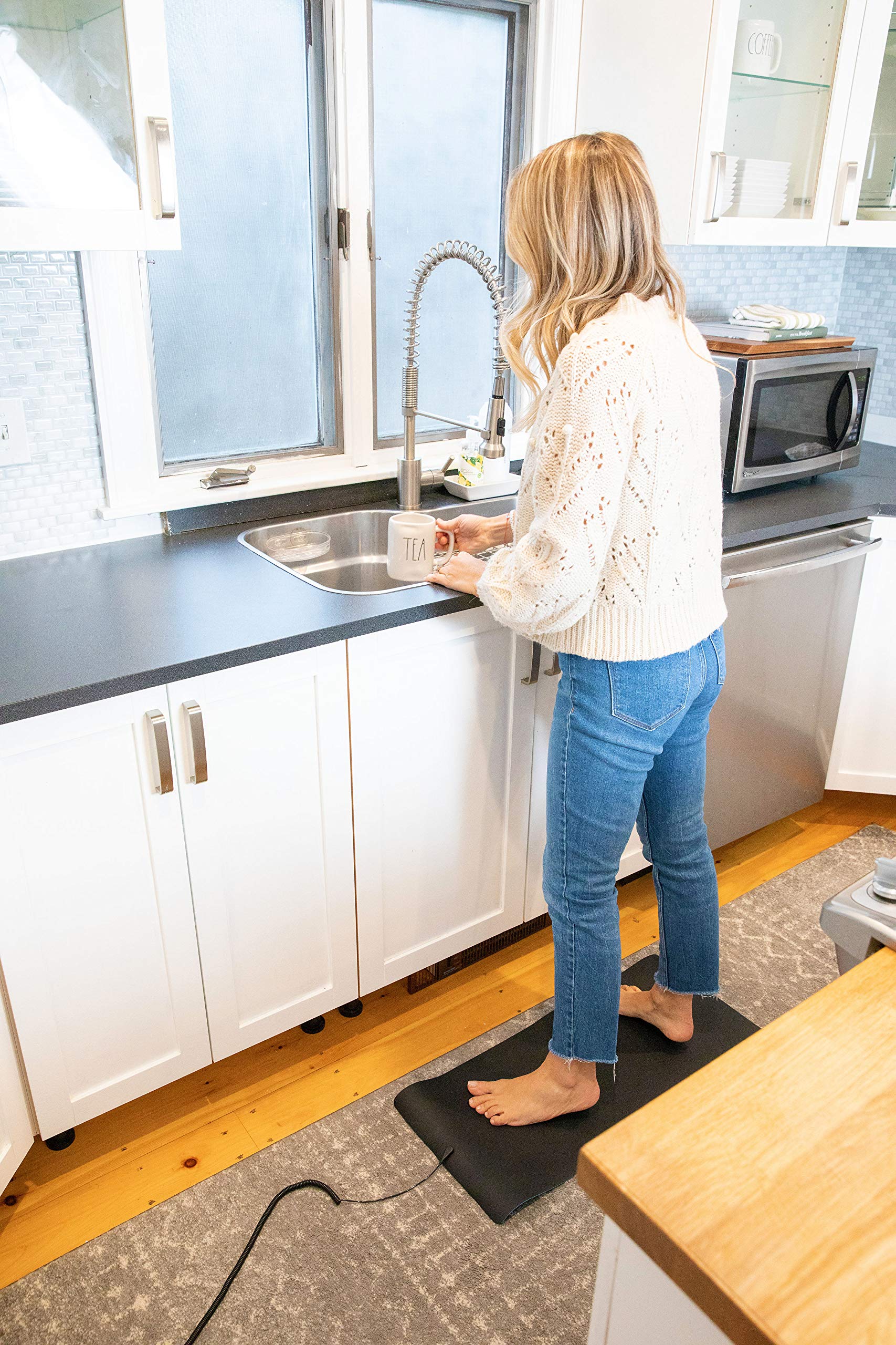 Earthing Universal Mat Kit near the kitchen counter for daily routine comfort.