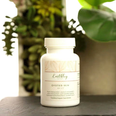 Earthley Oyster-Min capsules being poured from bottle for easy daily use