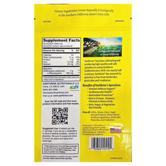 Earthrise spirulina 500mg tablets closeup, bright green pills rich in nutrients.