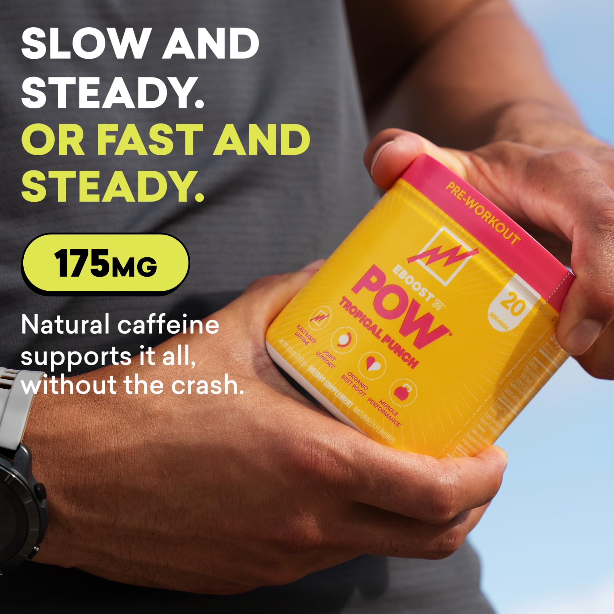 EBOOST POW Tropical Punch glass showing fizzy pre-workout mix before training