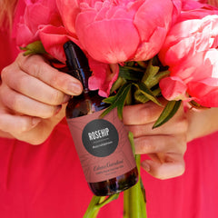 Edens Garden Rosehip Carrier Oil bottle with dropper showing pure golden hydration for skin.