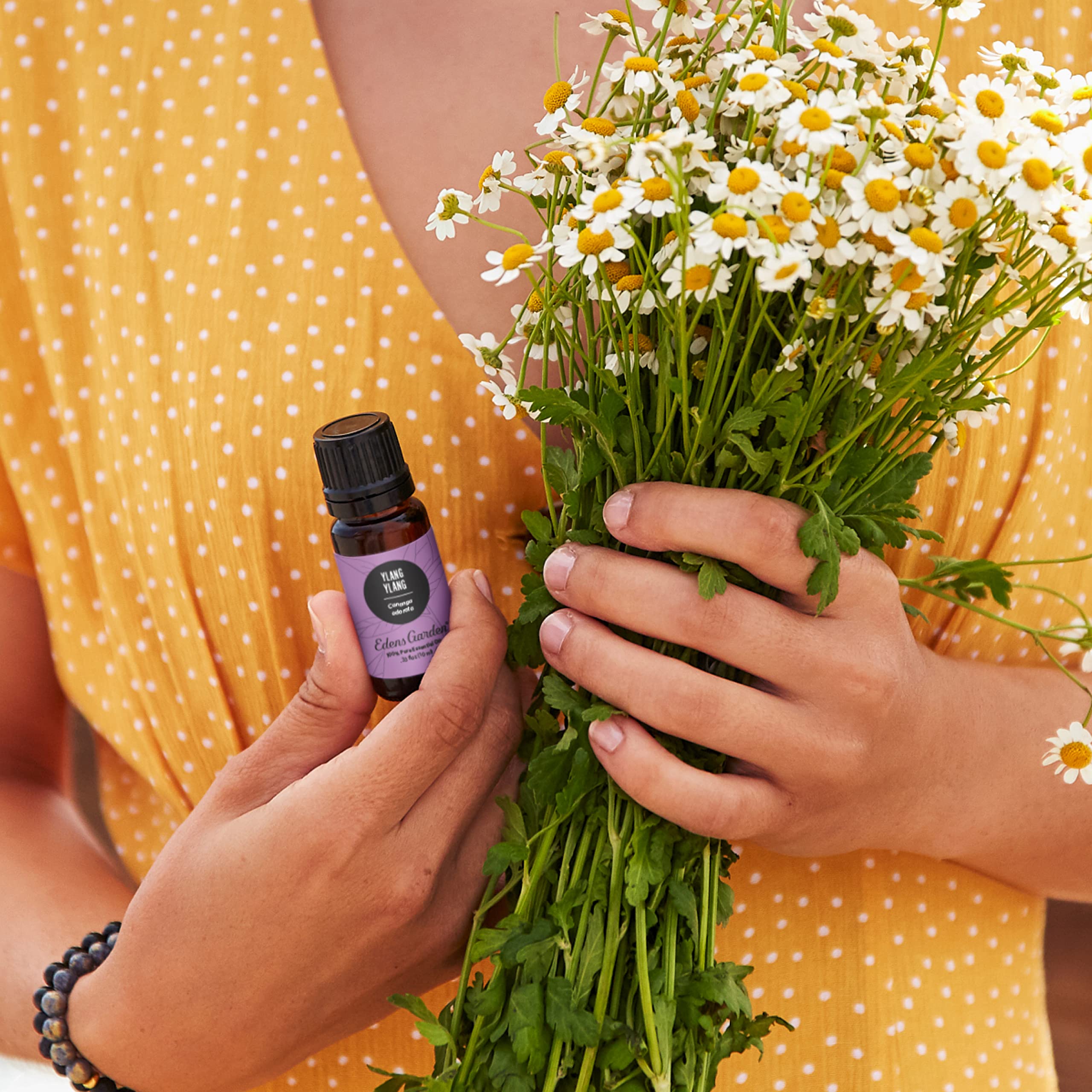 Edens Garden Ylang Ylang diffuser setup creates relaxing floral ambiance.