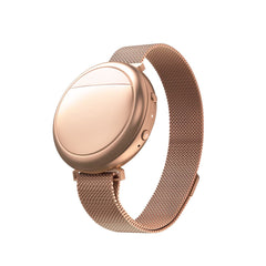 Embr Wave rose gold bracelet on the wrist, discreet cooling or warming.