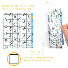 EmoAunty grid-cut tattoo tape showing 1 cm squares for easy sizing