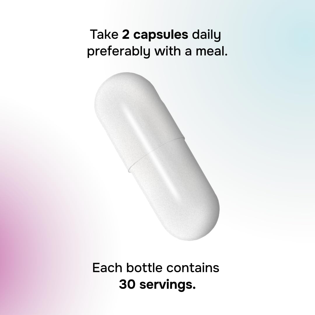 Envitamin Slimbiosys bottle on desk with natural light conveying daily wellness
