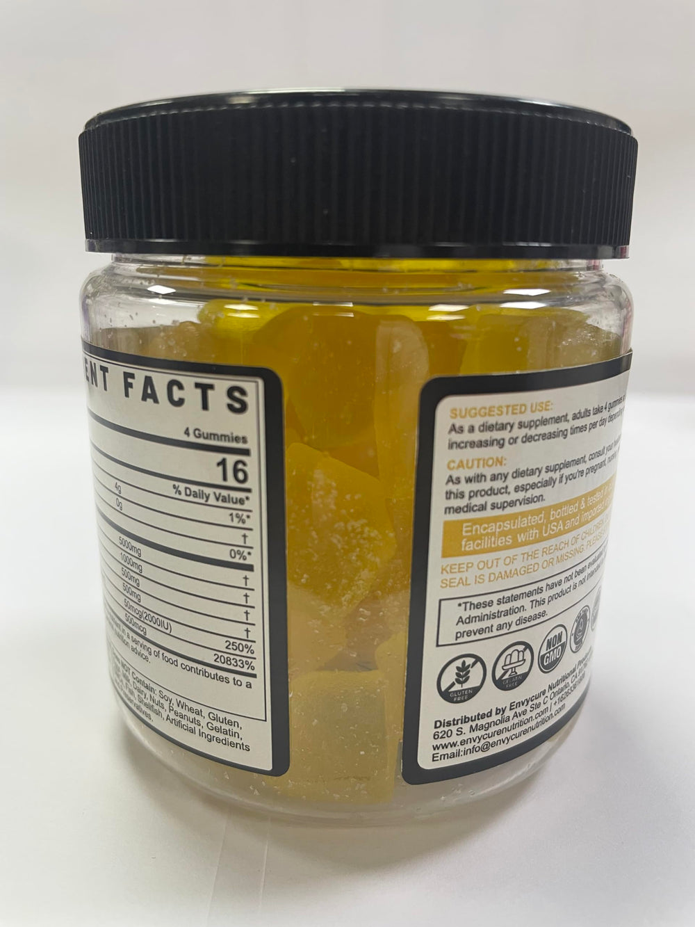 EnvyCure Creatine Monohydrate Gummies bottle with lemon flavor branding on white background.