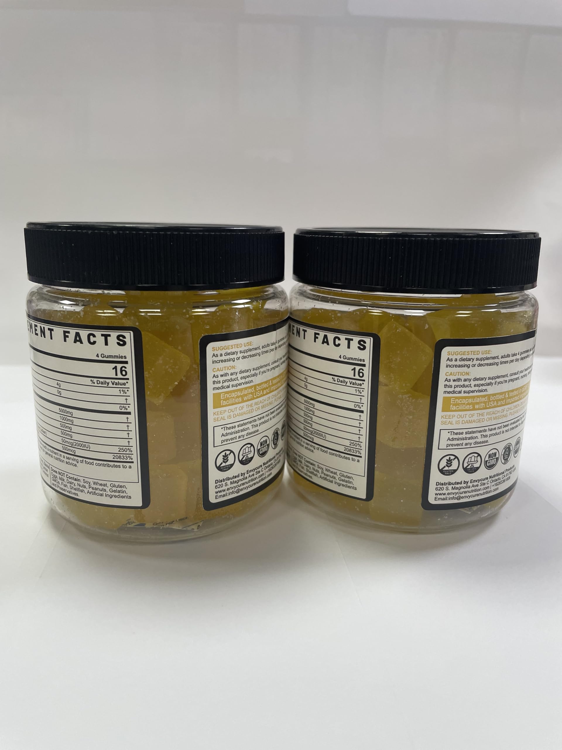 EnvyCure Creatine Gummies with glass of water for daily use