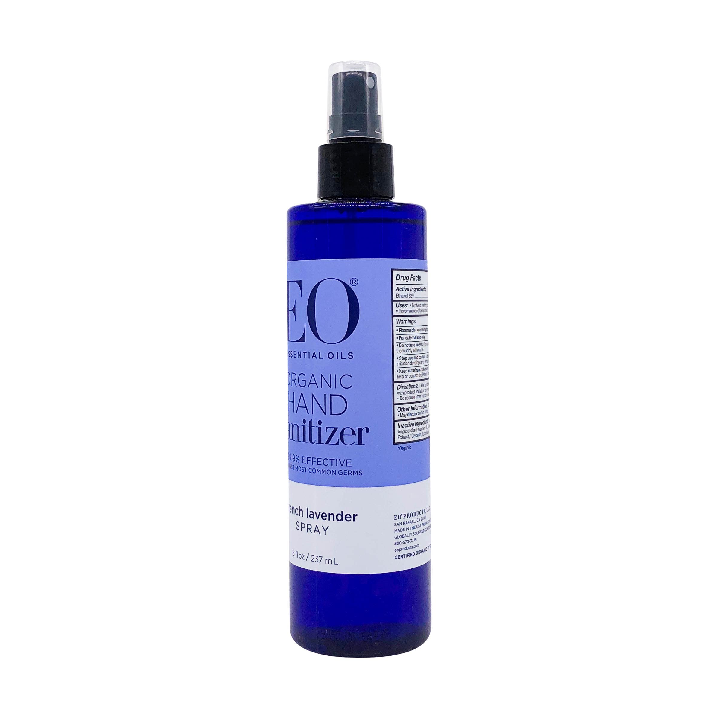Close-up of EO Organic French Lavender bottle with lavender petals, emphasizing fragrance focus.