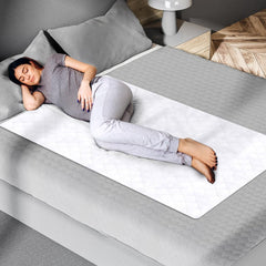 Epica bed pads 34x52 waterproof pack in use on a bed for adult incontinence protection