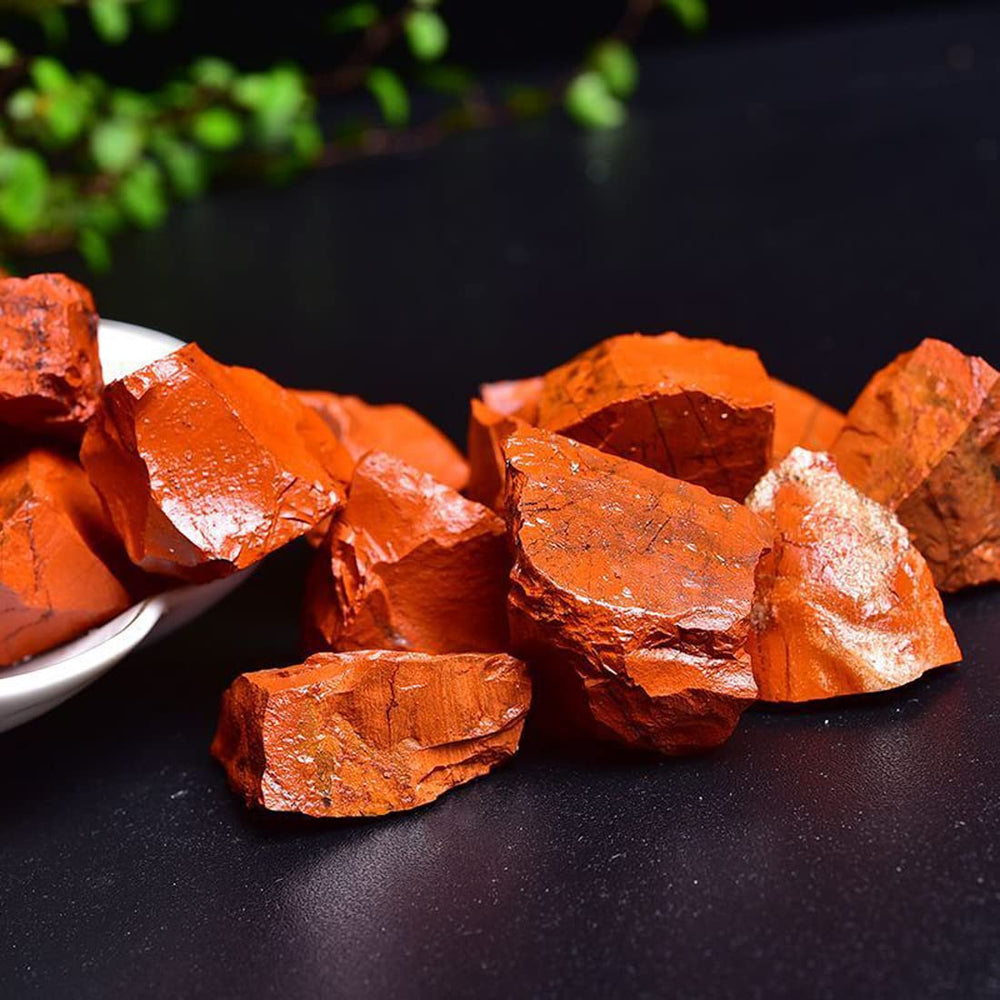 Erliway Red Jasper crystal in hand highlighting size and variation