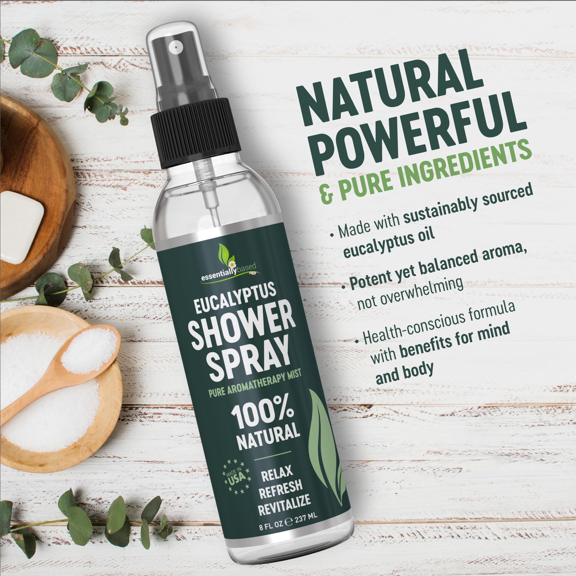 EssentiallyBased eucalyptus shower spray bottle closeup showing 8oz bottle and purity