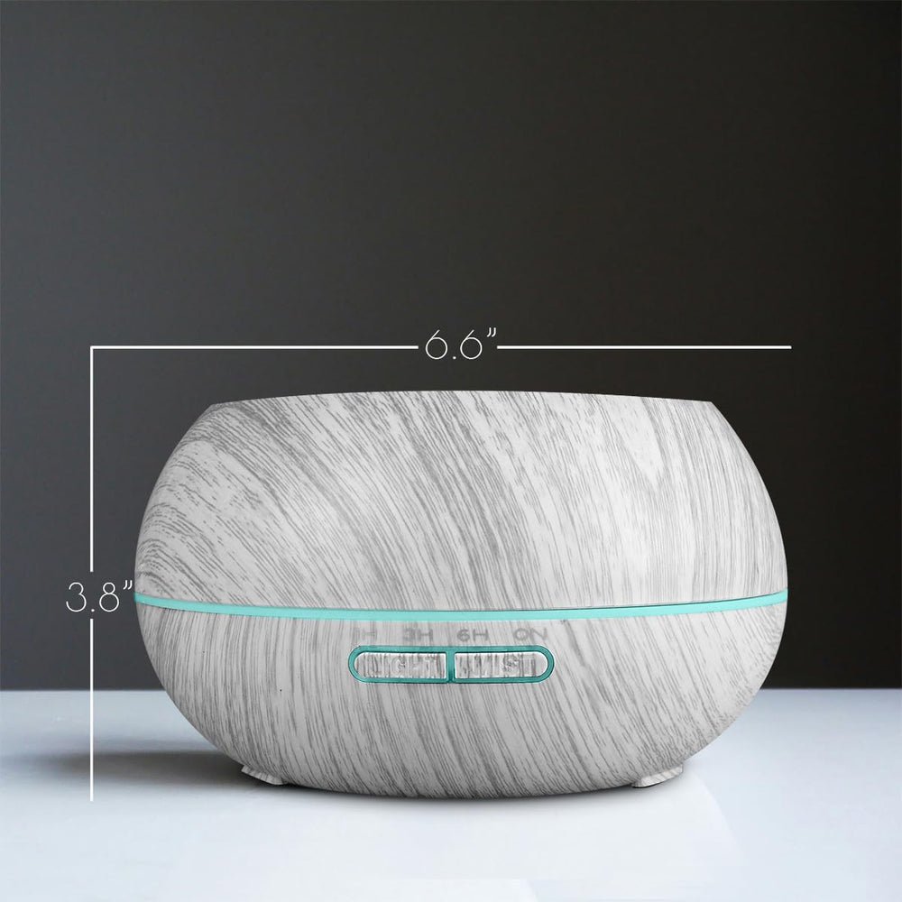 Essentil diffuser showing seven LED colors for ambient night lighting.