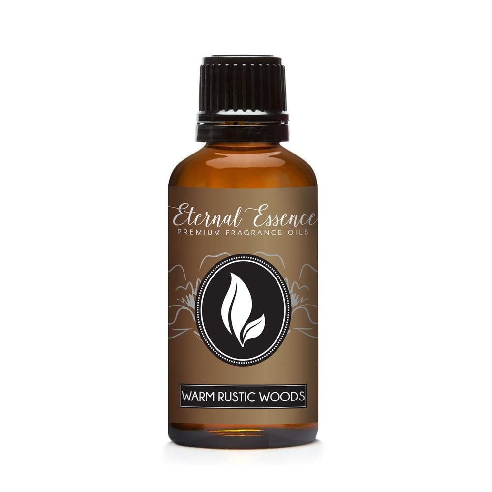 Eternal Essence Oils Warm Rustic Woods bottle close-up with dropper for precise blending.