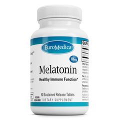 EuroMedica Melatonin bottle on nightstand suggests restful sleep support.
