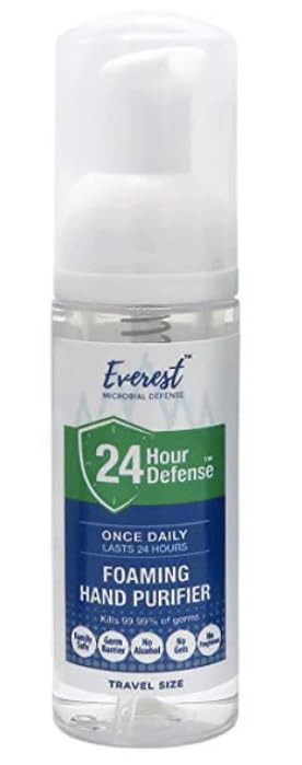 Everest foam sanitizer being applied to hand showing moisturizing formula