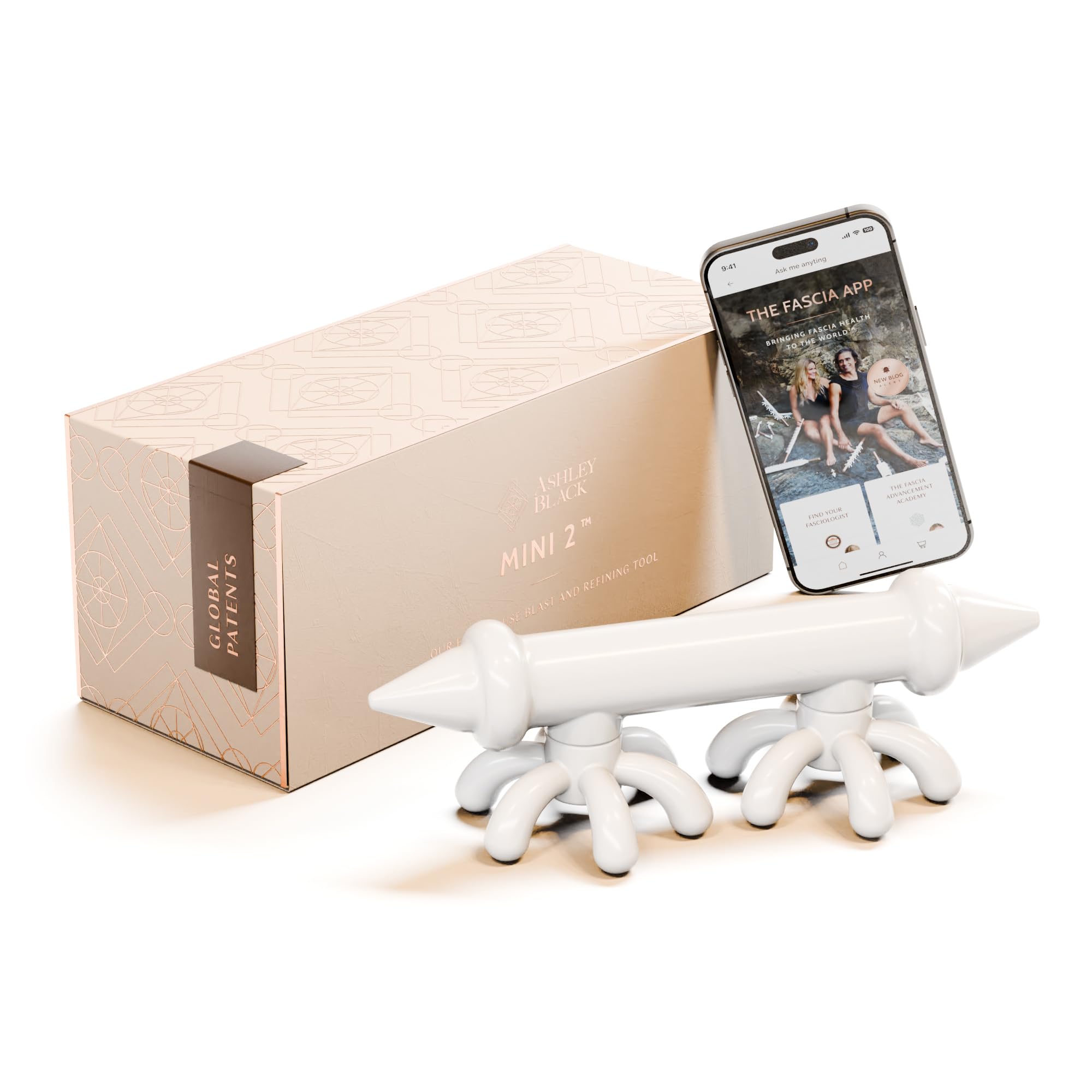 FasciaBlaster Mini 2 handheld massager on leg muscles for temporary relief