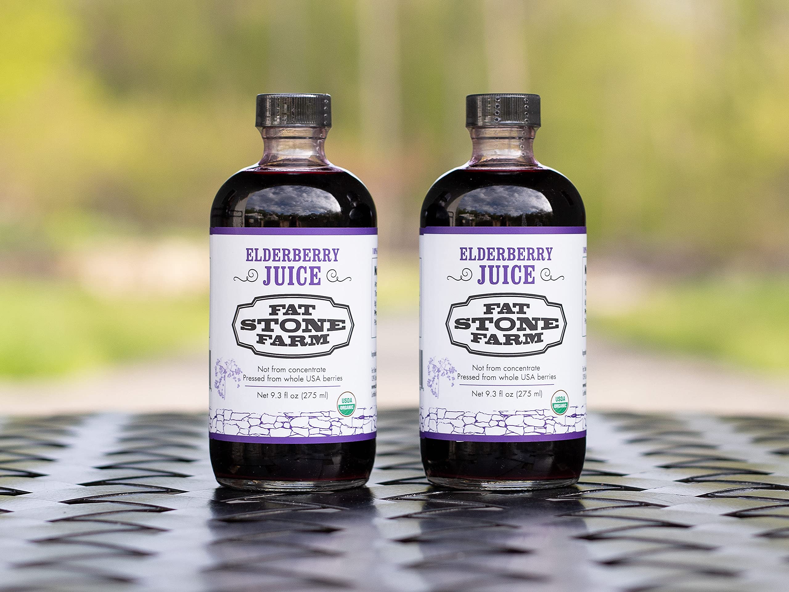 Fat Stone Farm elderberry juice stored in fridge for freshness.