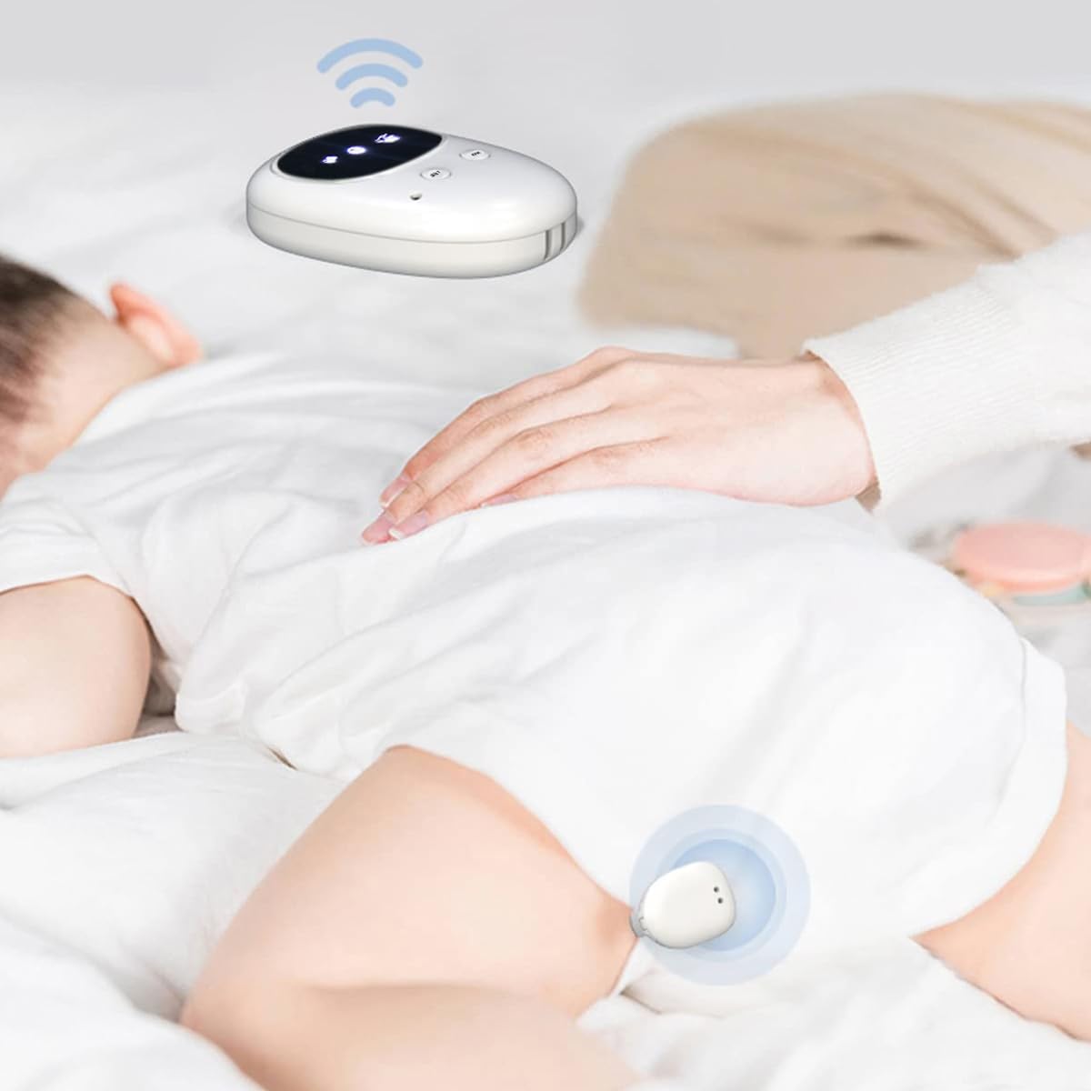 Fency bedwetting alarm receiver placed beside the bed for caregiver alerts