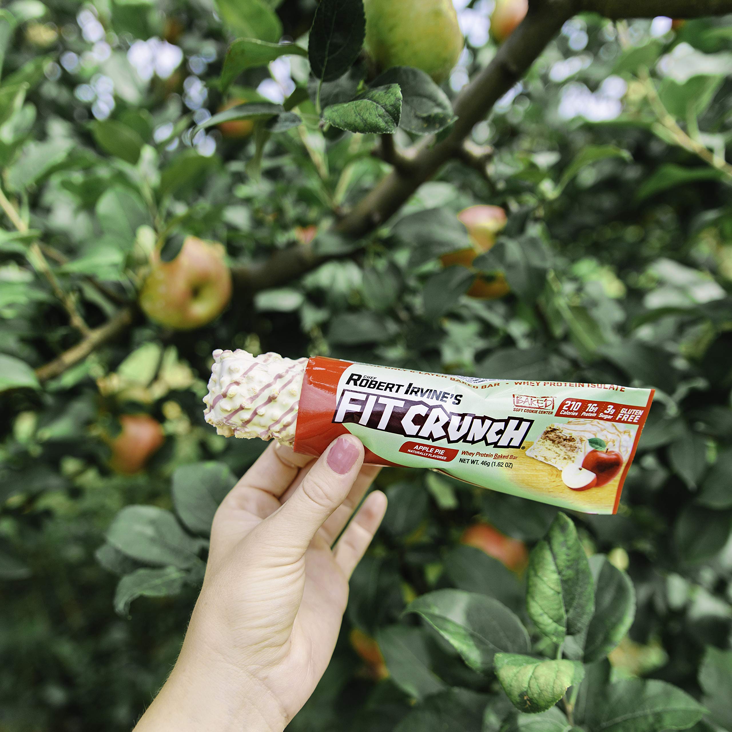 Gym bag scene with Fit Crunch bar as post-workout fuel.