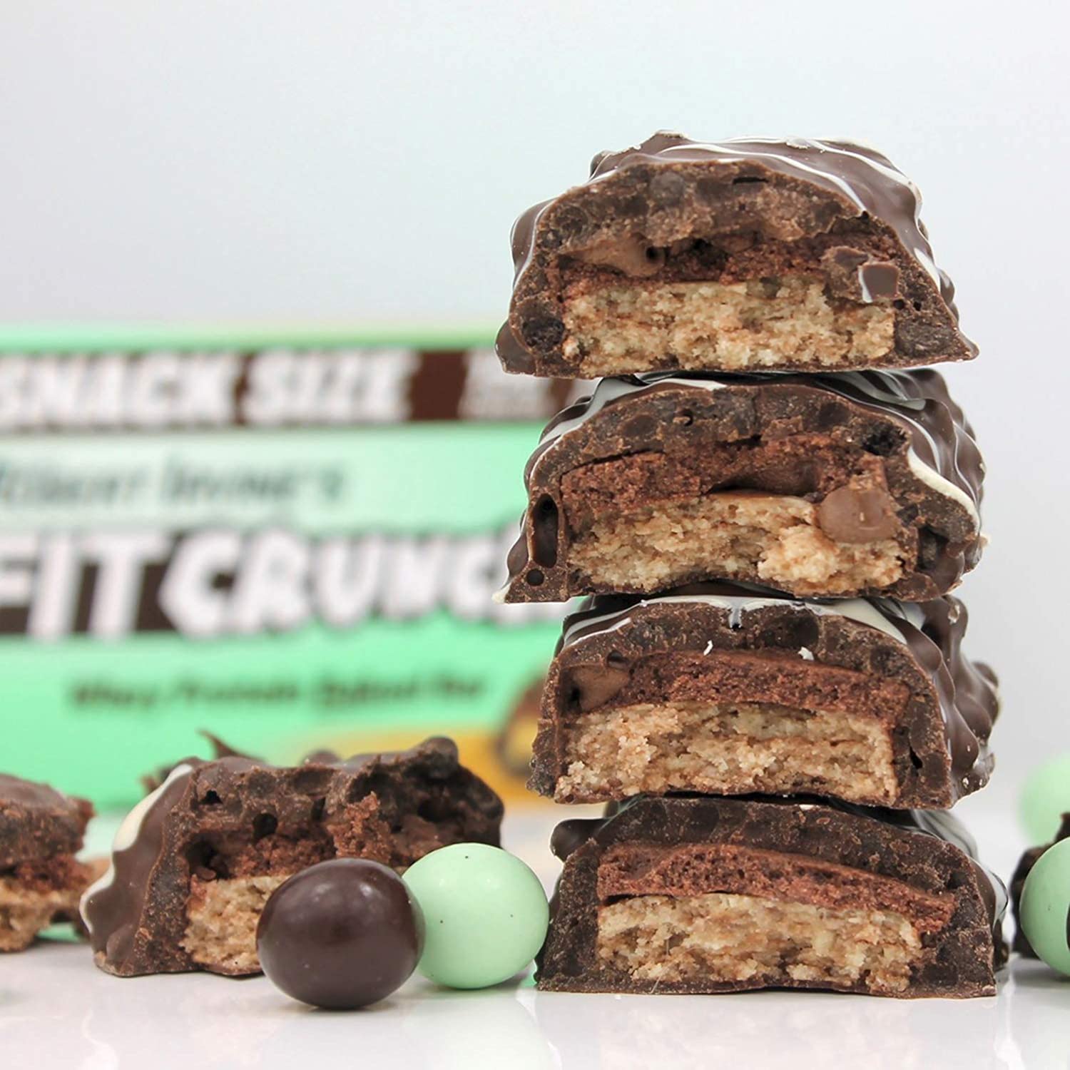 Fit Crunch bars in pocket demonstrates portable protein for workouts or study breaks.