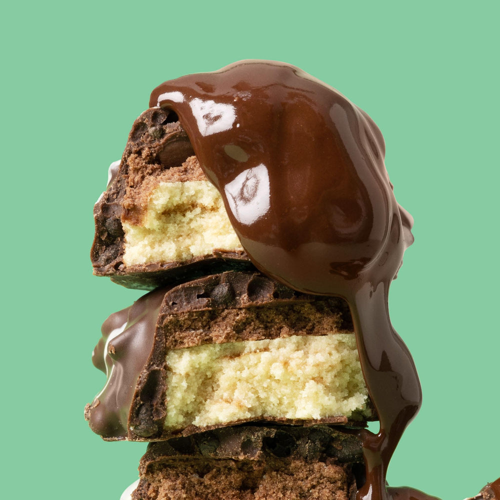 FITCRUNCH Protein bar packaging and 18-bar pack on display