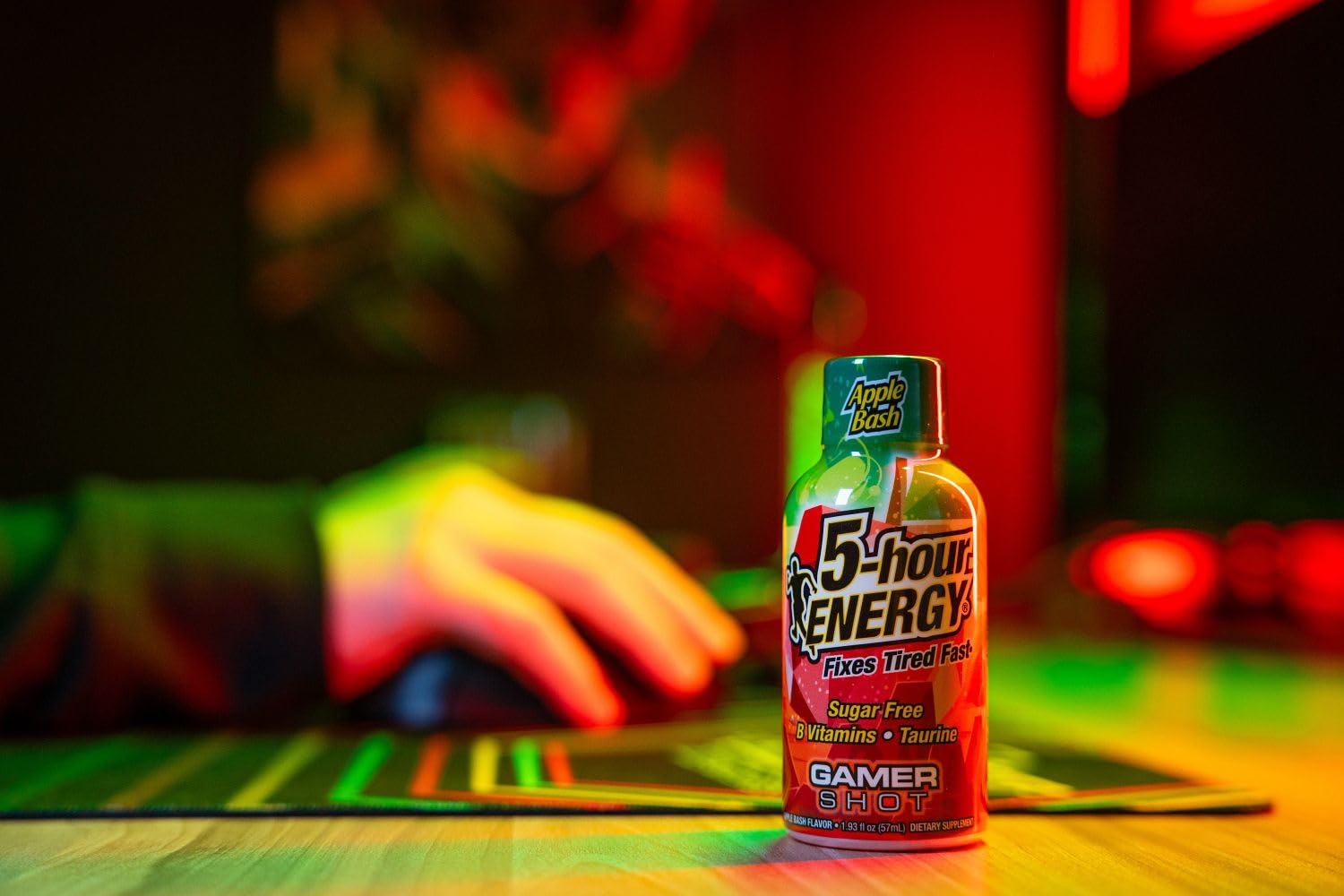 Gaming break setup with Apple Bash bottle ready for a quick boost.