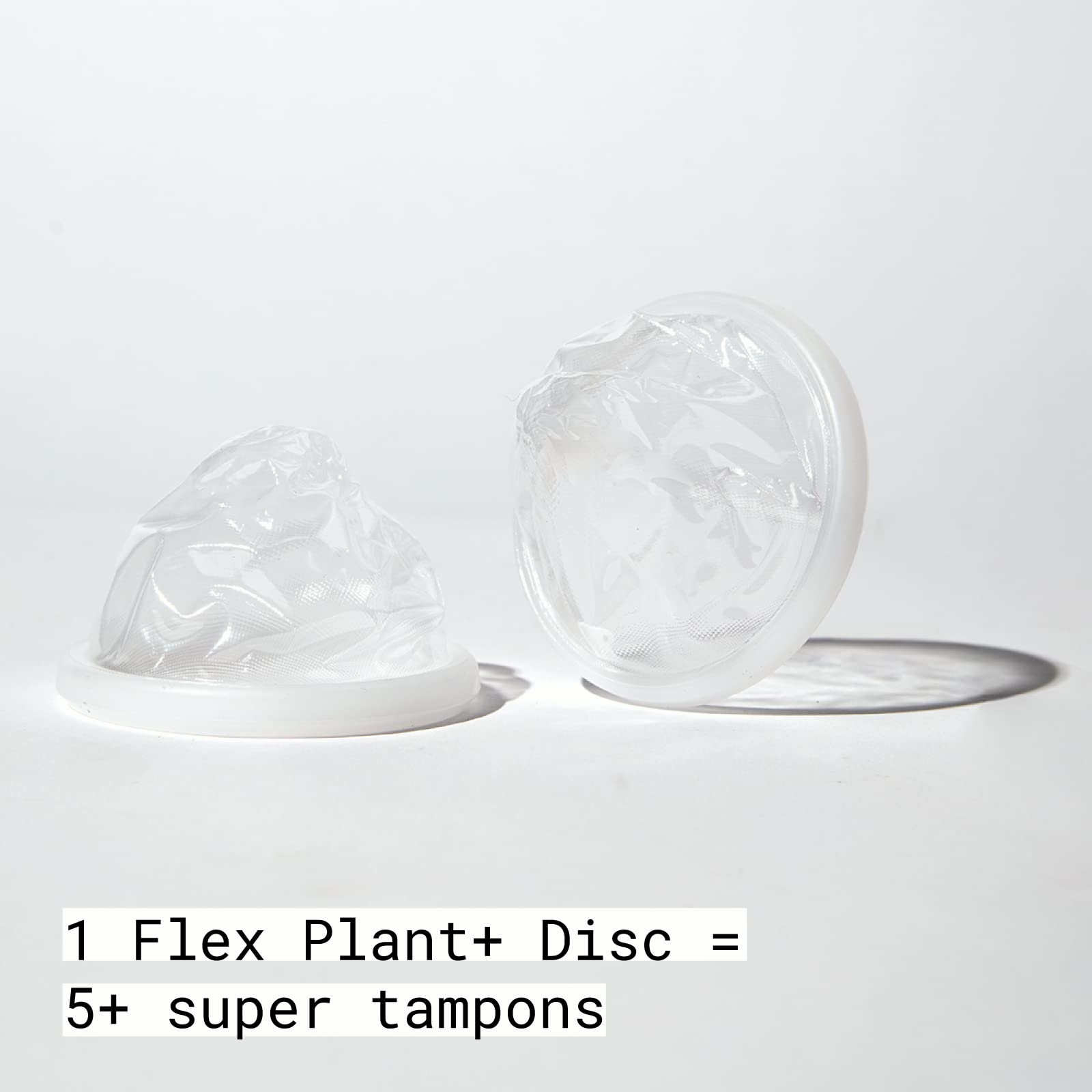 Hand inserting FLEX Plant+ Disc with EasyFold rim for simple placement.