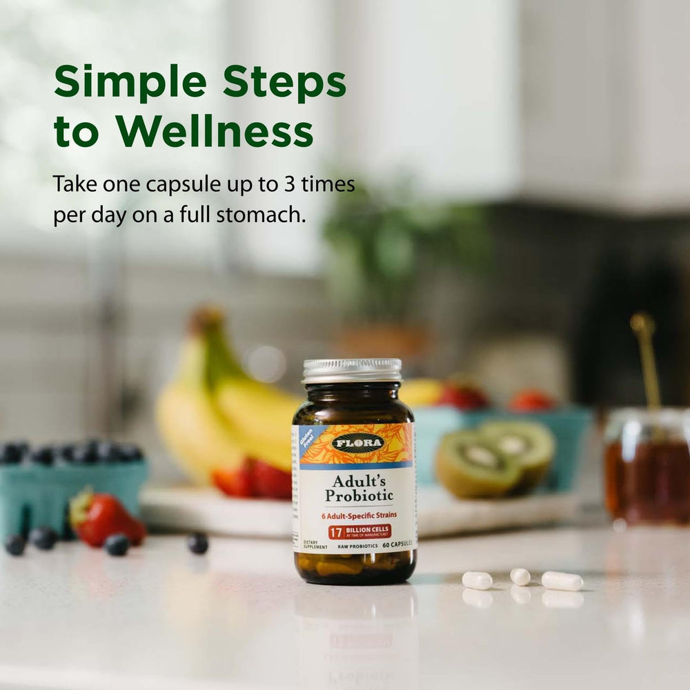 Flora Adult’s Probiotic refrigeration scene suggests keeping capsules cool for viability.